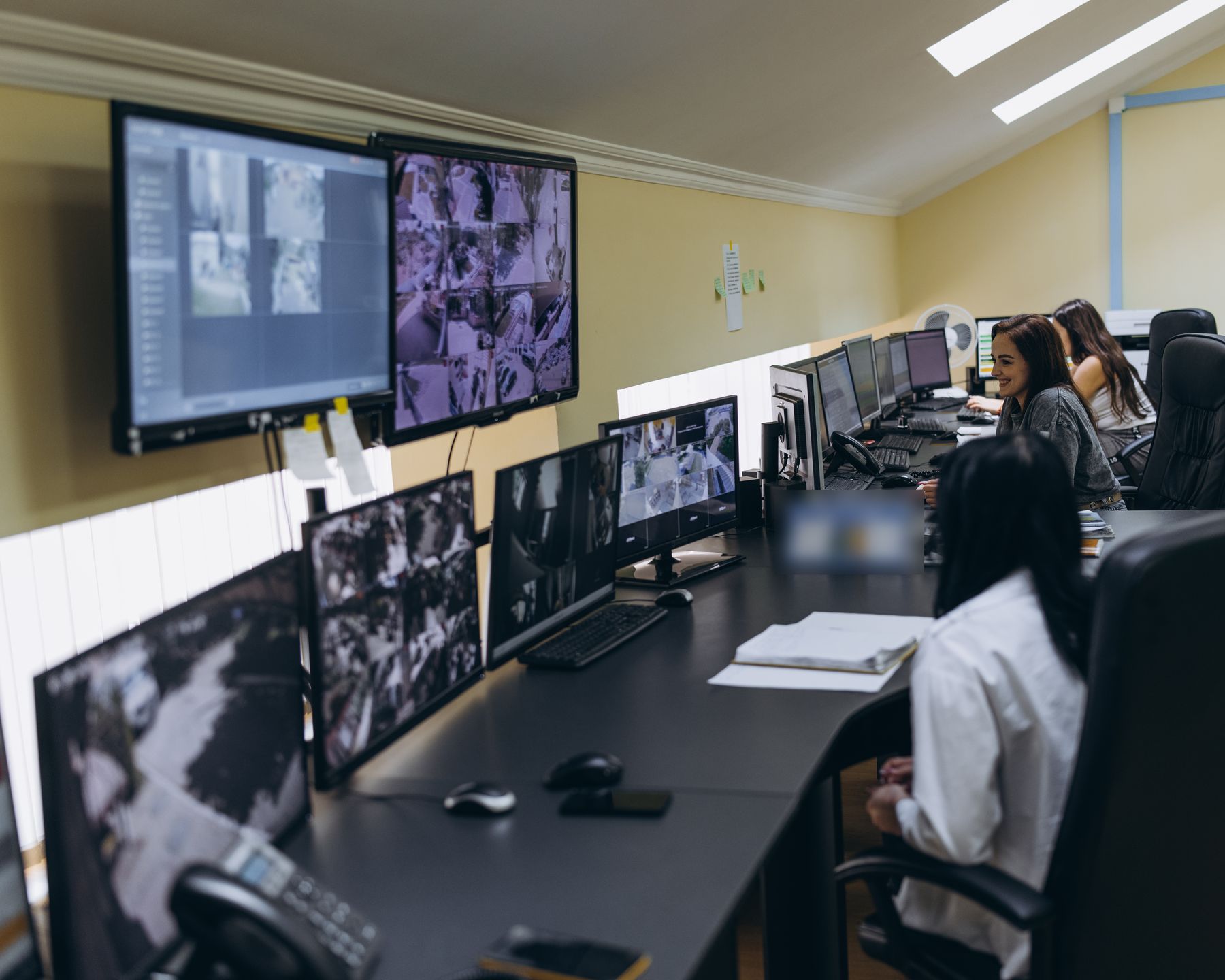 Operators at TIGR Security Group's 24/7 monitoring centre