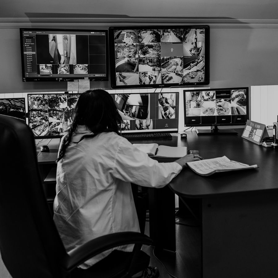 Operator reviewing multi-camera video feeds